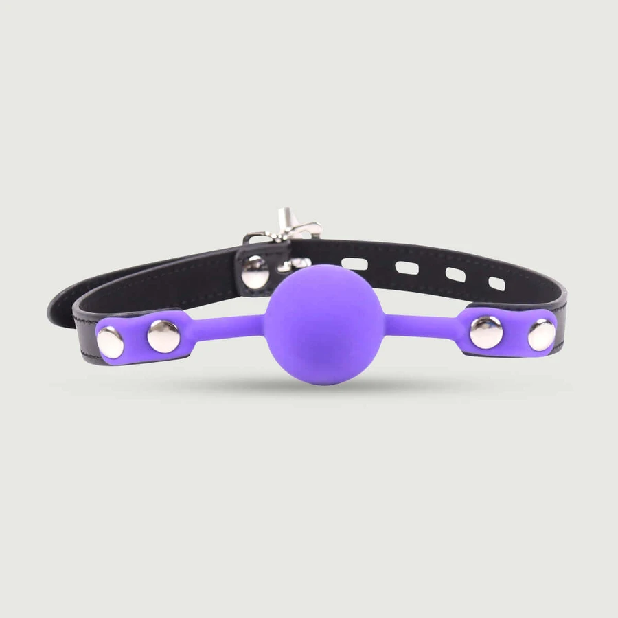 Căluș din piele reglabil cu bilă mov - negru/violet